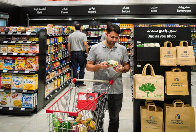 a man who is shopping groceries in Dubai