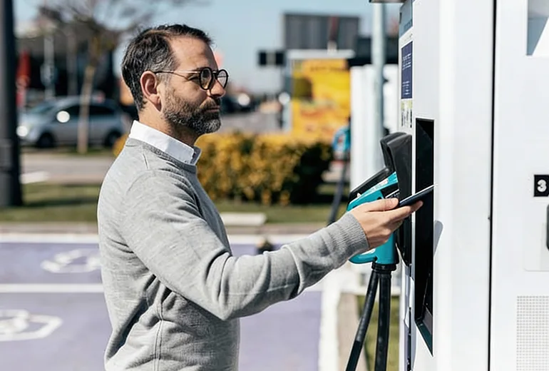 a man using Smart Kiosks at Petrol Stations