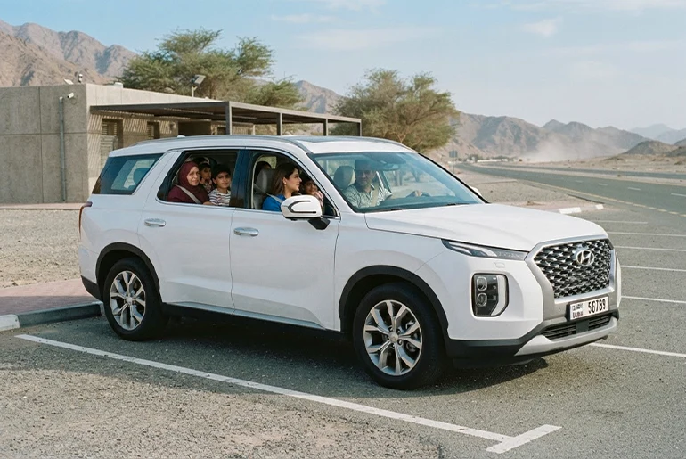 a family in Hyundai Palisade in Dubai
