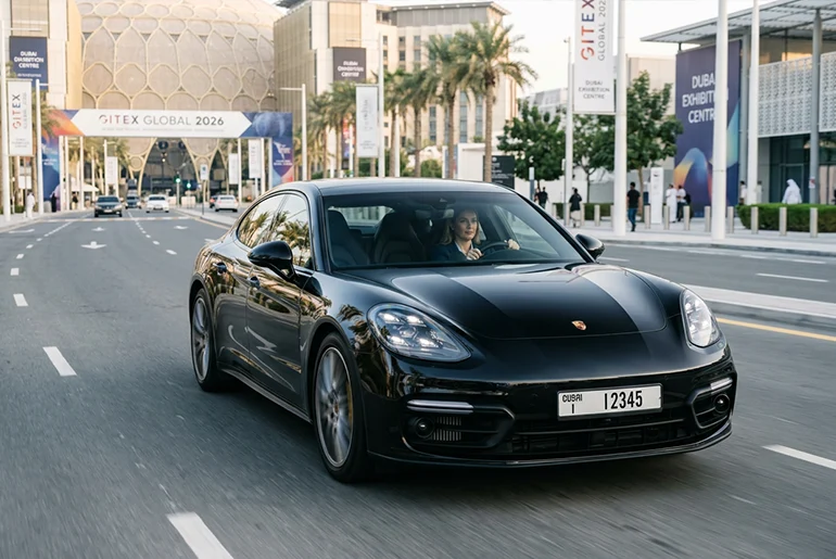 a woman in Porsche in Dubai